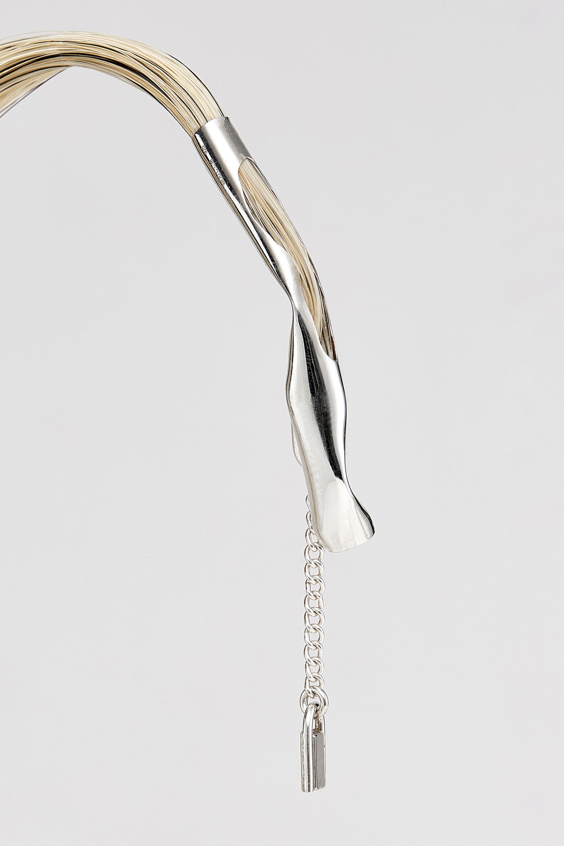 Silver Tube with Blonde Horse Tail Hair