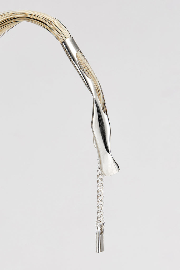 Silver Tube with Blonde Horse Tail Hair